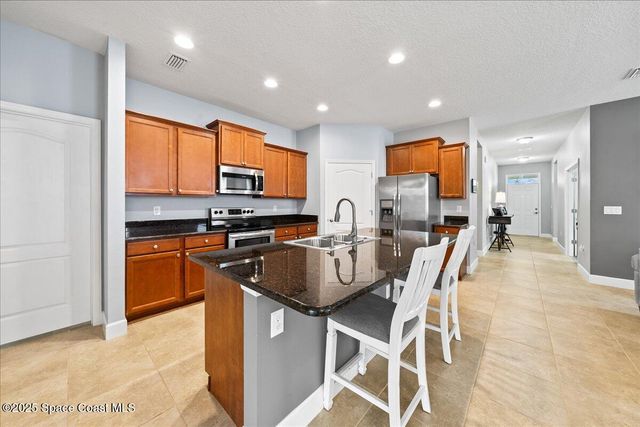 745 Remington Green Drive SE, Palm Bay, FL 32909