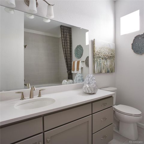 6153 N Ceylon Street 9-102, Denver, CO 80249