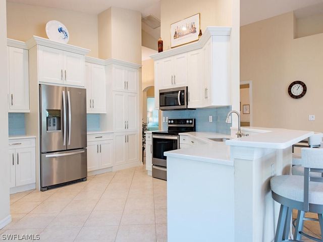 64 Glen Eagle CIR, Naples, FL 34104