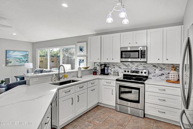 1382 EASTWIND Drive N, Jacksonville Beach, FL 32250