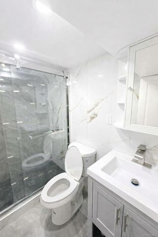 7305 Cook Avenue, Middle Village, NY 11379