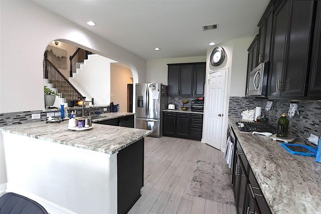 5311 Lotus Canyon Court, Richmond, TX 77407