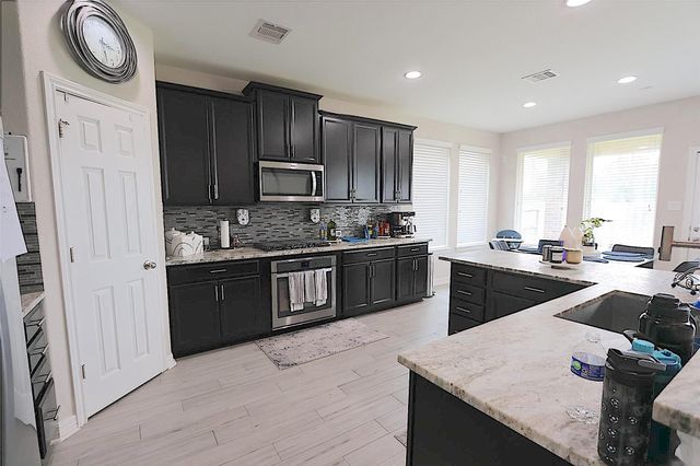 5311 Lotus Canyon Court, Richmond, TX 77407