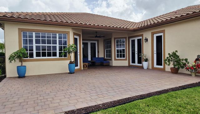 10311 Peninsula Place, Parkland, FL 33076