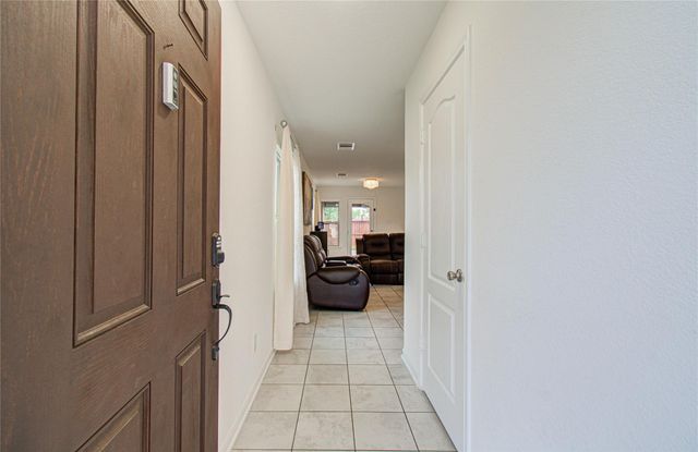 20730 Oakley Falls Drive, Katy, TX 77449