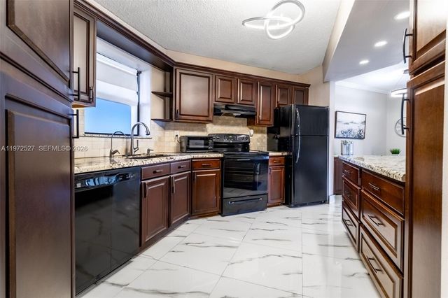 6855 W Broward Blvd 201, Plantation, FL 33317