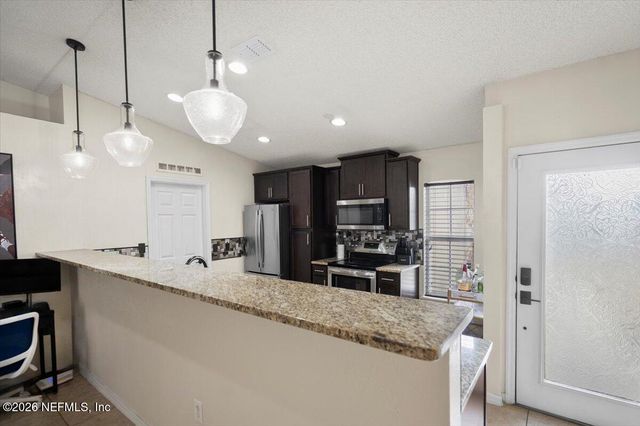 10310 WOODLEY POINT Road, Jacksonville, FL 32218