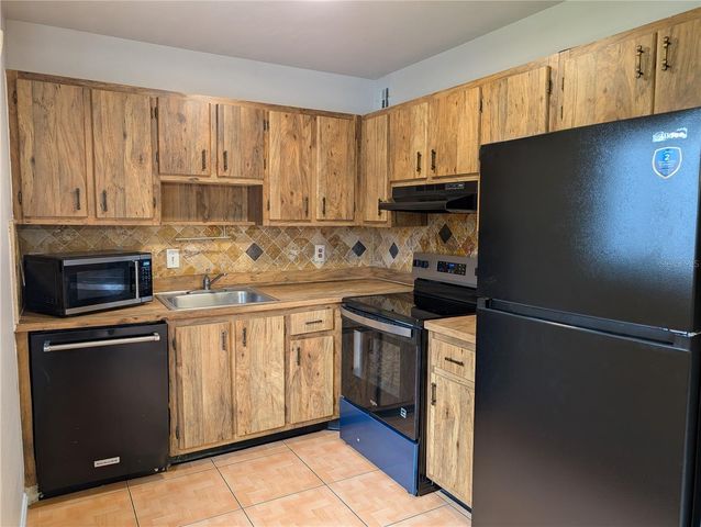 2439 OAK PARK WAY 217, Orlando, FL 32822