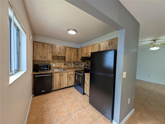 2439 OAK PARK WAY 217, Orlando, FL 32822