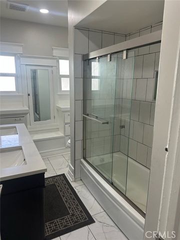 4041 Denker, Los Angeles, CA 90062