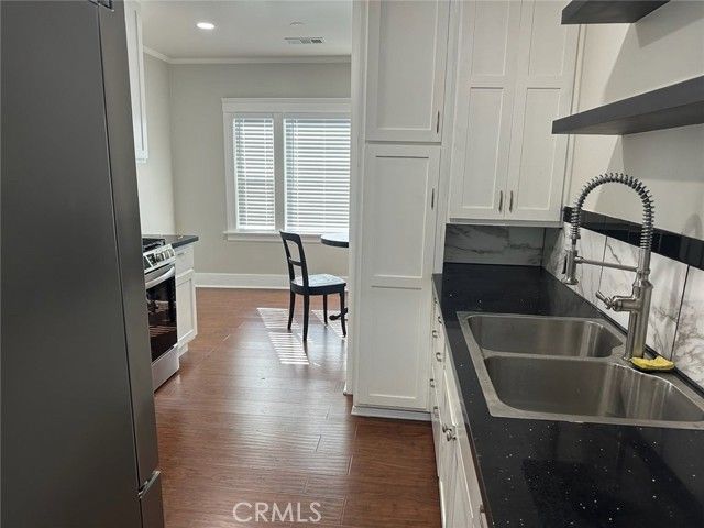 4041 Denker, Los Angeles, CA 90062