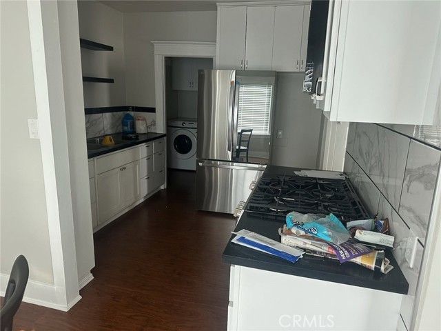 4041 Denker, Los Angeles, CA 90062