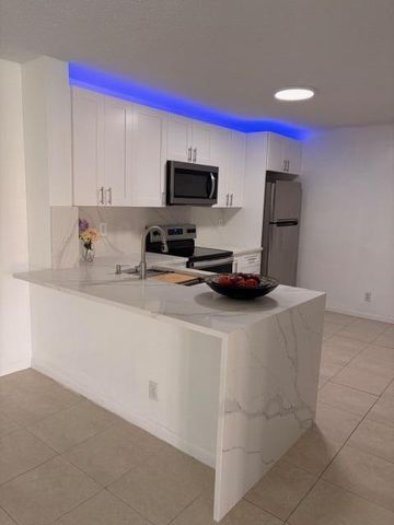 5661 Riverside Drive 203b7, Coral Springs, FL 33067