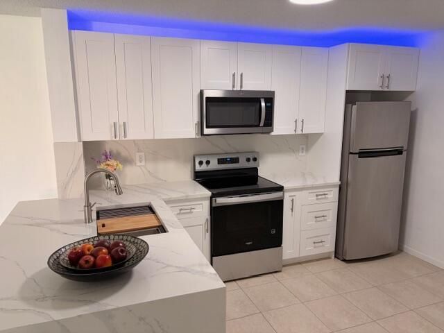 5661 Riverside Drive 203b7, Coral Springs, FL 33067