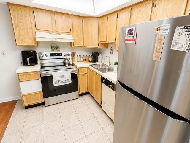 1131 ORANGE TREE CIRCLE W C, Palm Harbor, FL 34684