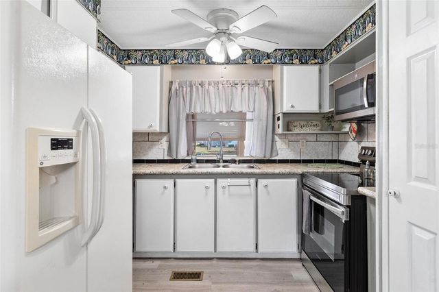 304 IVANHOE CIRCLE, Lady Lake, FL 32159