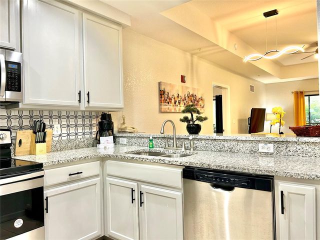 9055 TREASURE TROVE LANE 105, Kissimmee, FL 34747