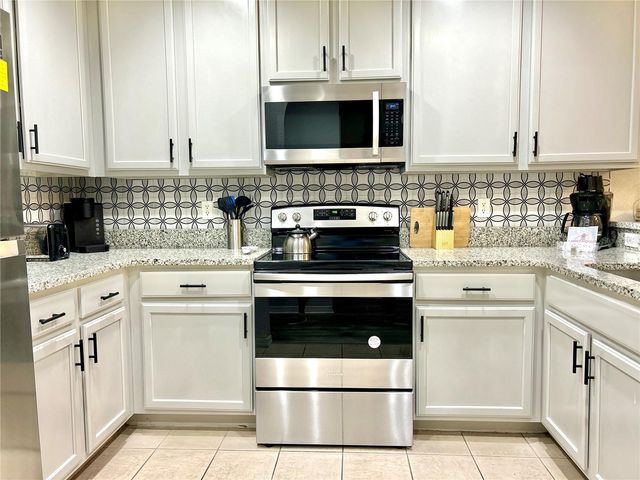 9055 TREASURE TROVE LANE 105, Kissimmee, FL 34747
