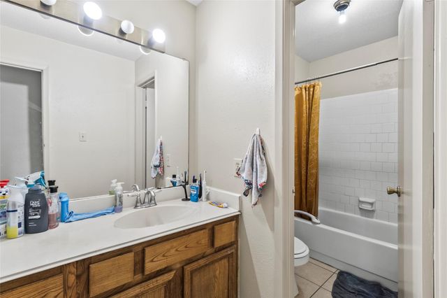 1 E Woodtimber Court, Spring, TX 77381