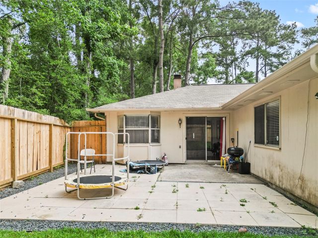1 E Woodtimber Court, Spring, TX 77381