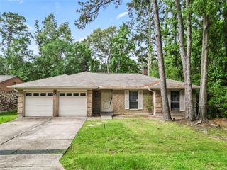 1 E Woodtimber Court, Spring, TX 77381