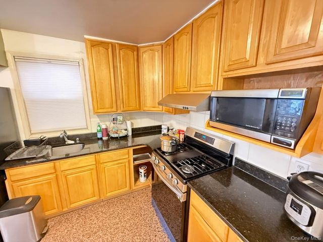 90-40 54th Avenue, Elmhurst, NY 11373