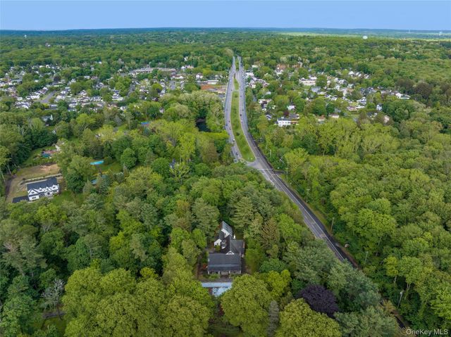 8 Woodstock Court, Muttontown, NY 11771