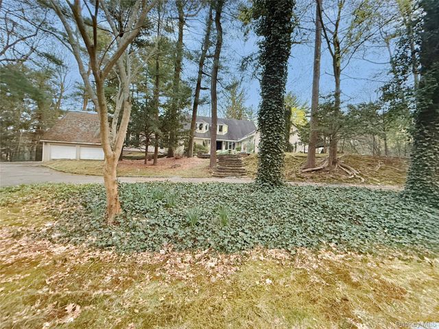 8 Woodstock Court, Muttontown, NY 11771