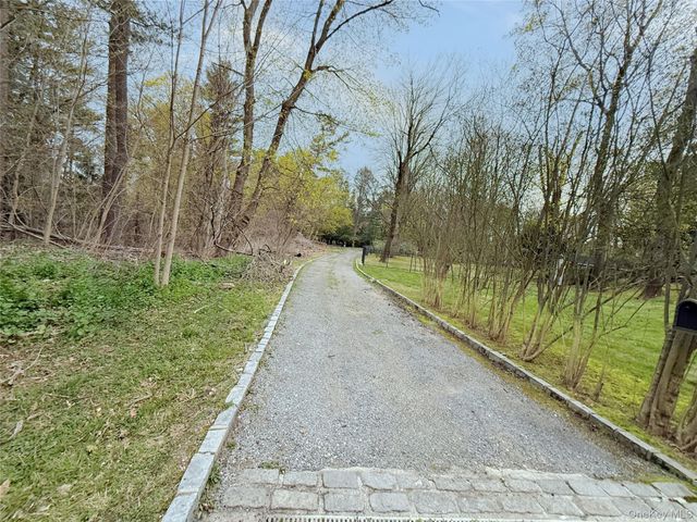 8 Woodstock Court, Muttontown, NY 11771