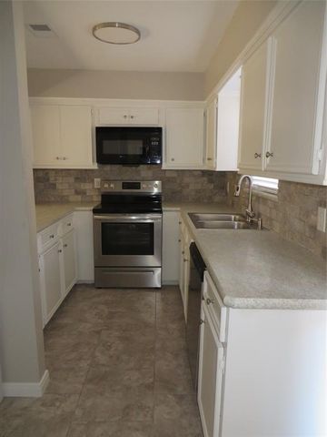 8716 Club House Drive 5, Willis, TX 77378
