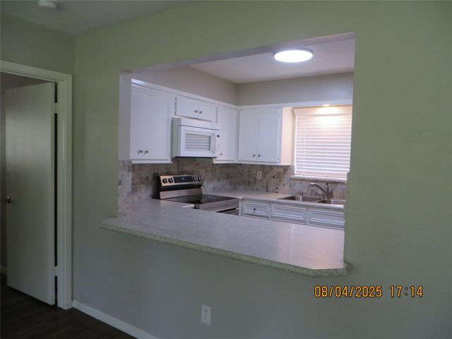 8716 Club House Drive 5, Willis, TX 77378