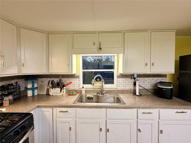 498 KING CHARLES CIRCLE, Deland, FL 32724