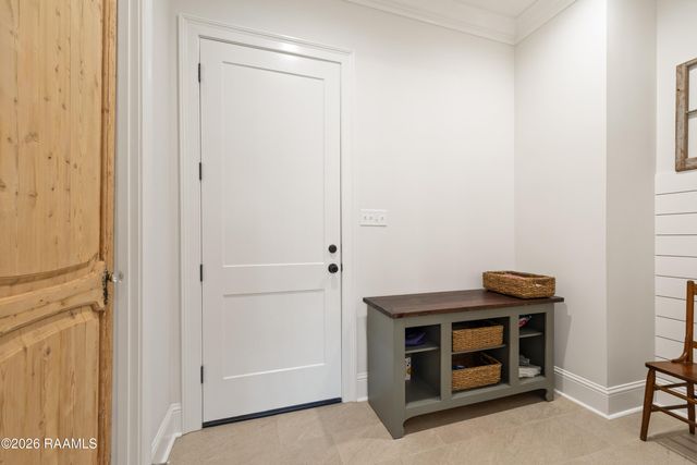 106 Carriage Lakes Drive, Youngsville, LA 70592