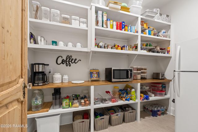 106 Carriage Lakes Drive, Youngsville, LA 70592