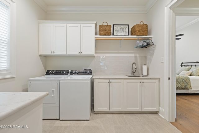 106 Carriage Lakes Drive, Youngsville, LA 70592