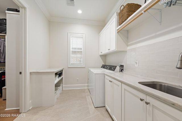 106 Carriage Lakes Drive, Youngsville, LA 70592