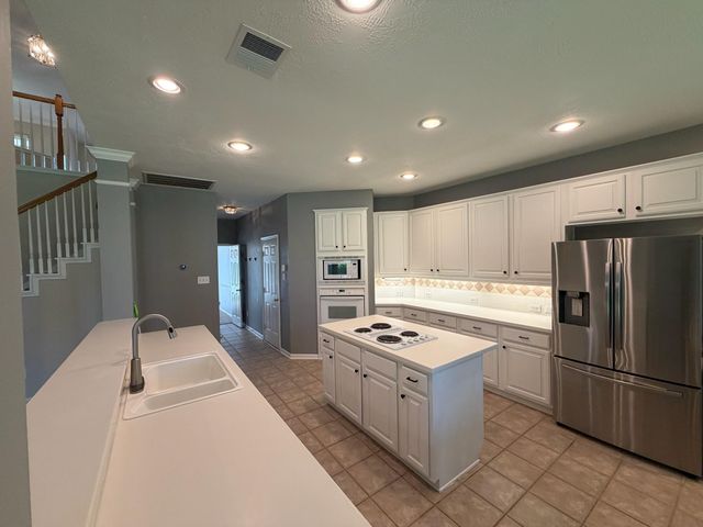 8419 Castle Pond Court, Houston, TX 77095