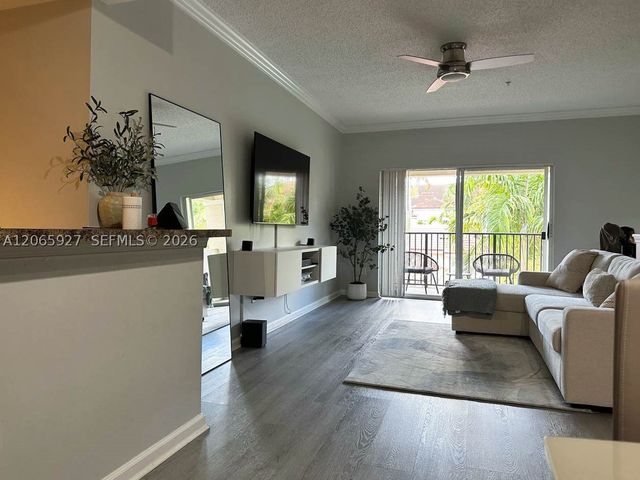 5840 W Sample Rd 305, Coral Springs, FL 33067