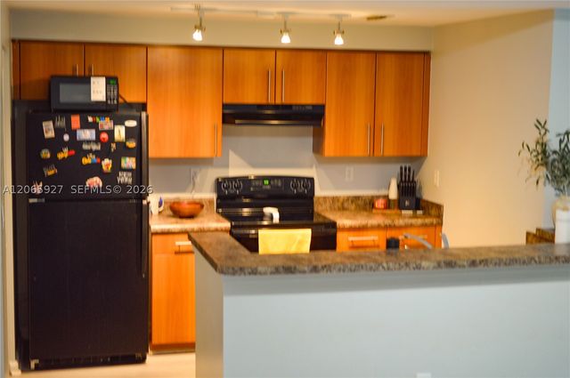 5840 W Sample Rd 305, Coral Springs, FL 33067