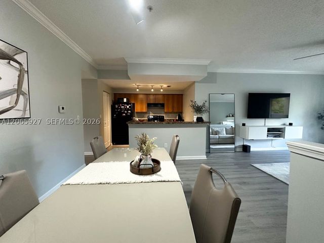 5840 W Sample Rd 305, Coral Springs, FL 33067