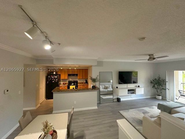 5840 W Sample Rd 305, Coral Springs, FL 33067