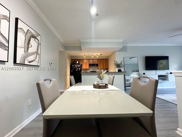 5840 W Sample Rd 305, Coral Springs, FL 33067