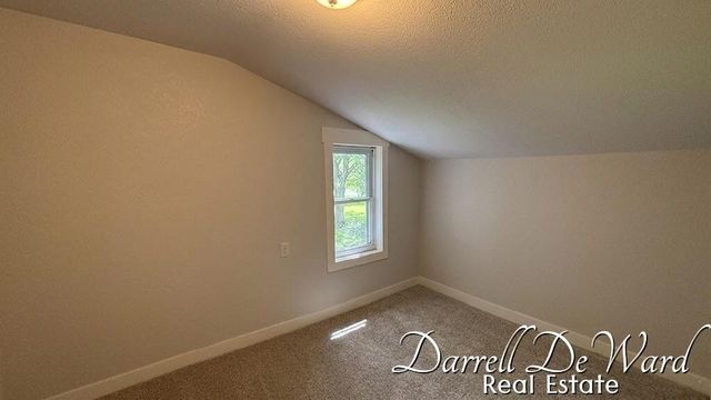 8425 N Holland Road, Six Lakes, MI 48886