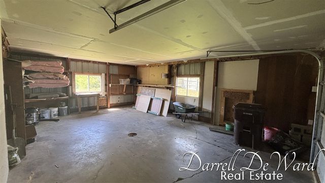 8425 N Holland Road, Six Lakes, MI 48886
