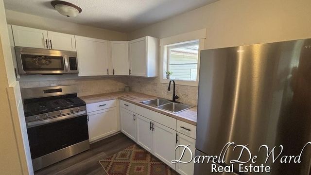 8425 N Holland Road, Six Lakes, MI 48886