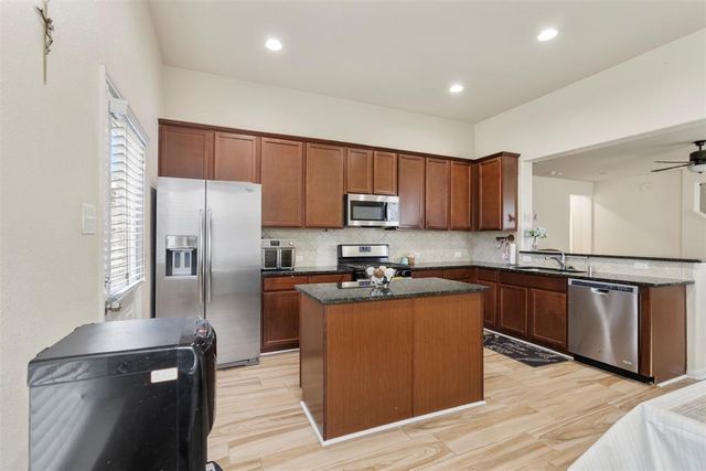 9412 Savannah Holly Drive, Houston, TX 77075