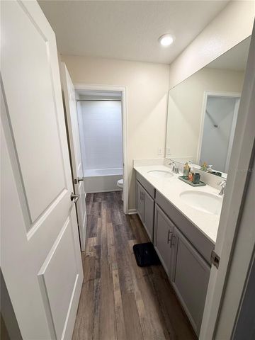 1048 DOWNSWING PLACE, Champions Gate, FL 33896