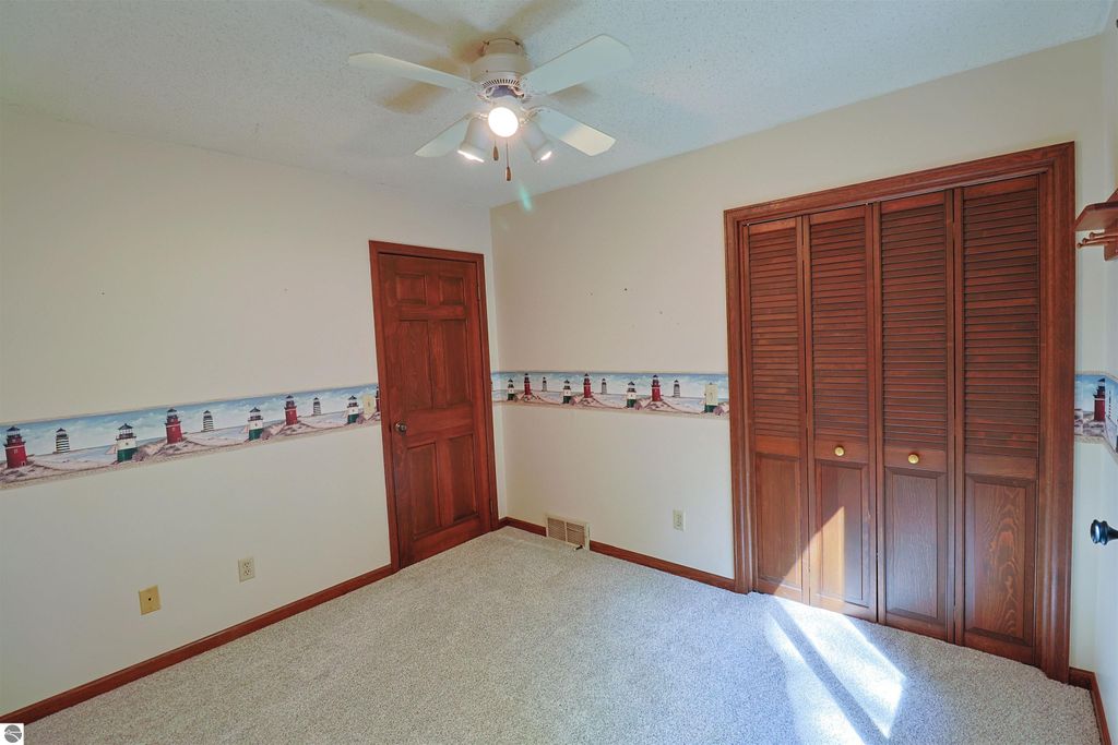 Image 11 of property listing at 8800 Golfside Court, Shepherd, MI 48883