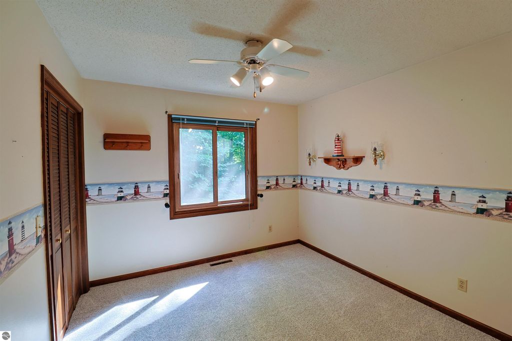 Image 12 of property listing at 8800 Golfside Court, Shepherd, MI 48883