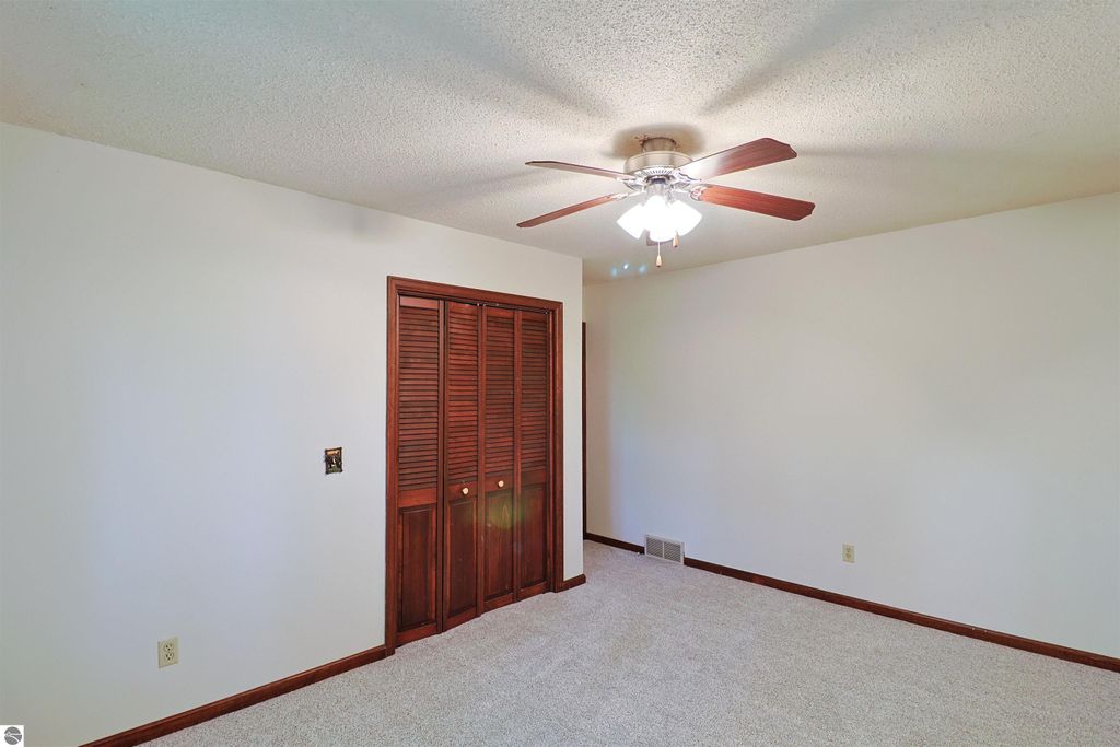 Image 13 of property listing at 8800 Golfside Court, Shepherd, MI 48883